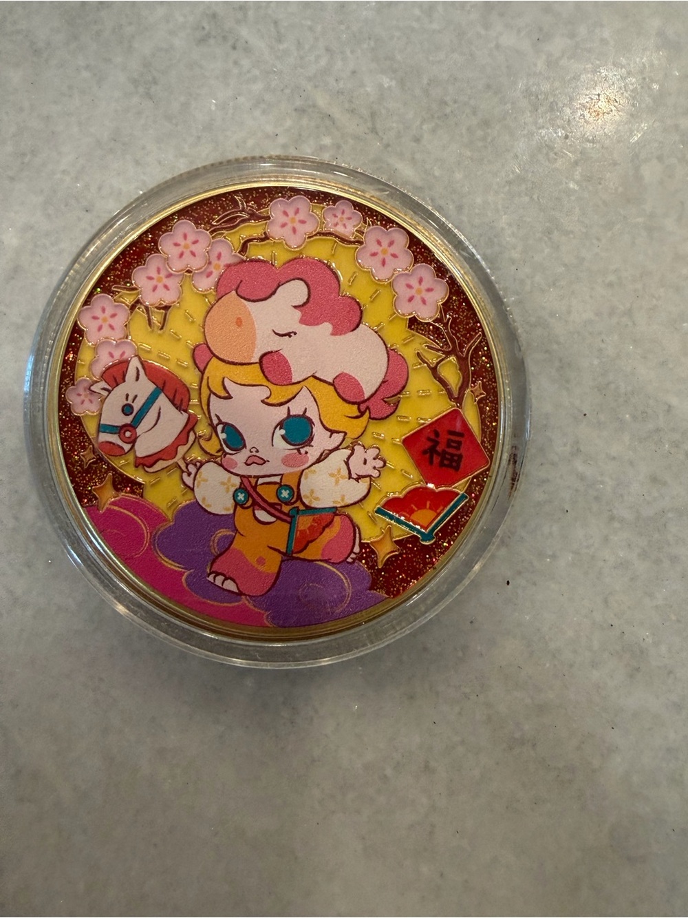 Pop Mart’s Molly Collectible Coin from Pop Land